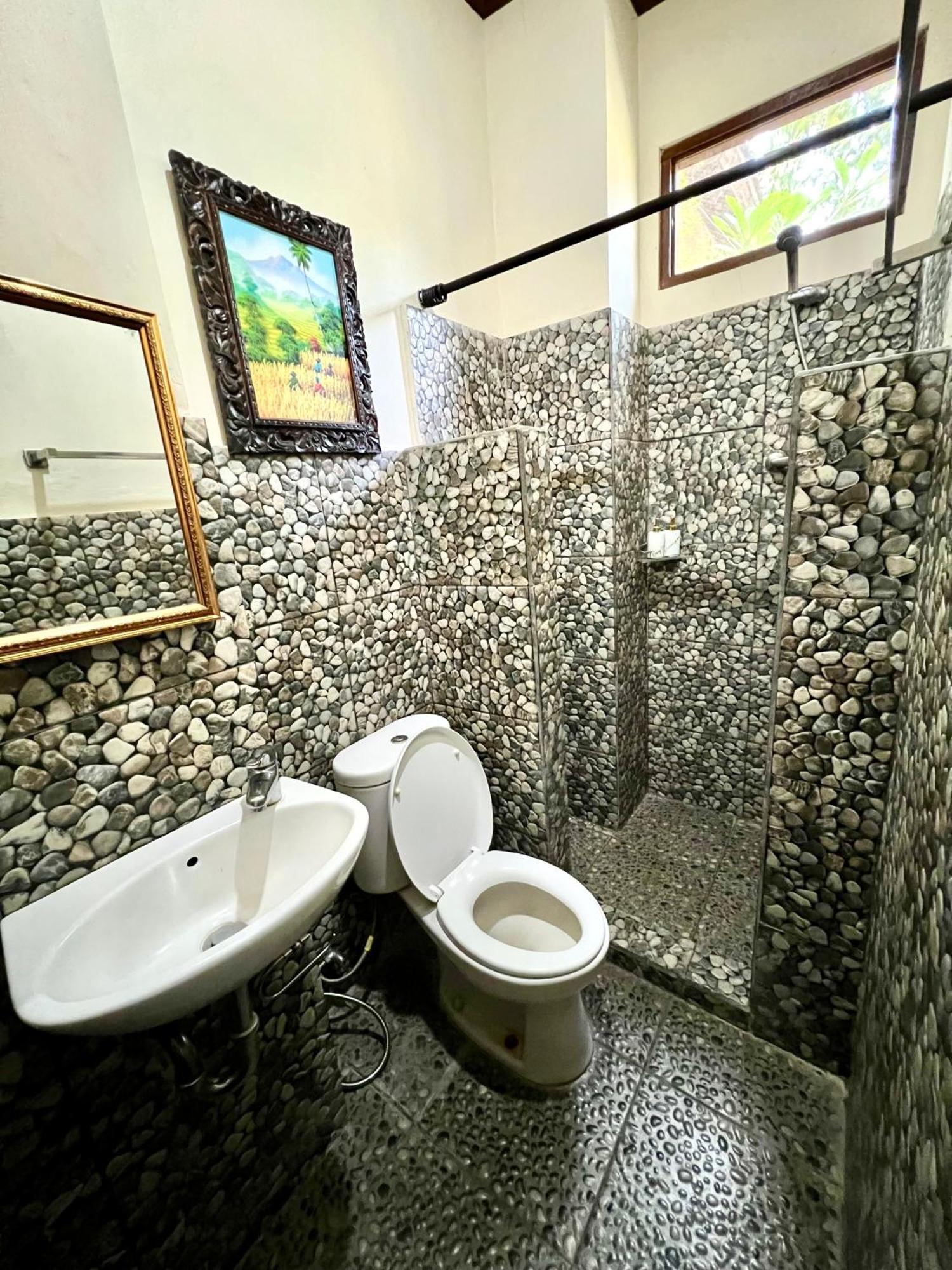 Guesthouse Gusti Putu Oka Ubud Extérieur photo